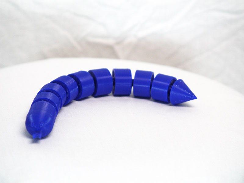 A 3D printed snake made up of 10 segments, which connect together using ball joints.